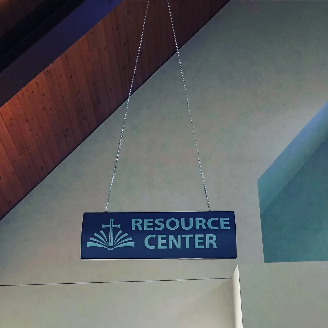 Resource Center Suspended Wayfinding Sign for Community Resource Center — Commercial Signage installed by Stingray Signs LLC