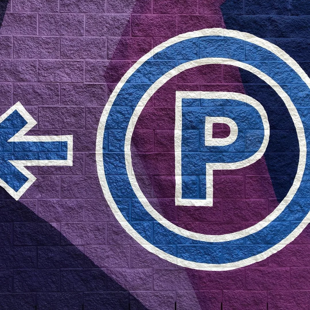 Textured Brick Wall Parking Directional Sign for Commercial Parking Structure — Commercial Signage installed by Stingray Signs LLC
