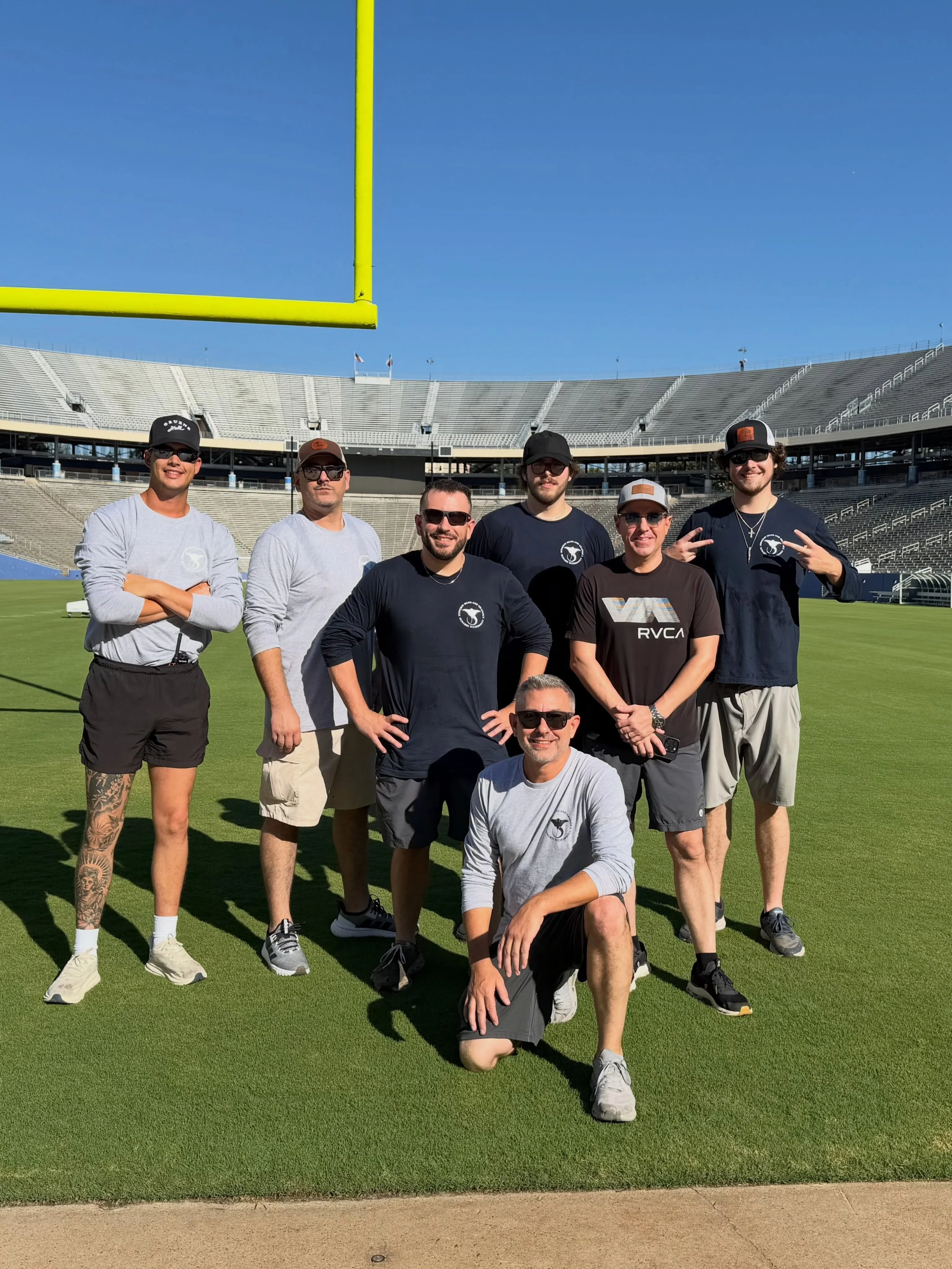 Stingray Signs LLC team on the field at Cotton Bowl Stadium